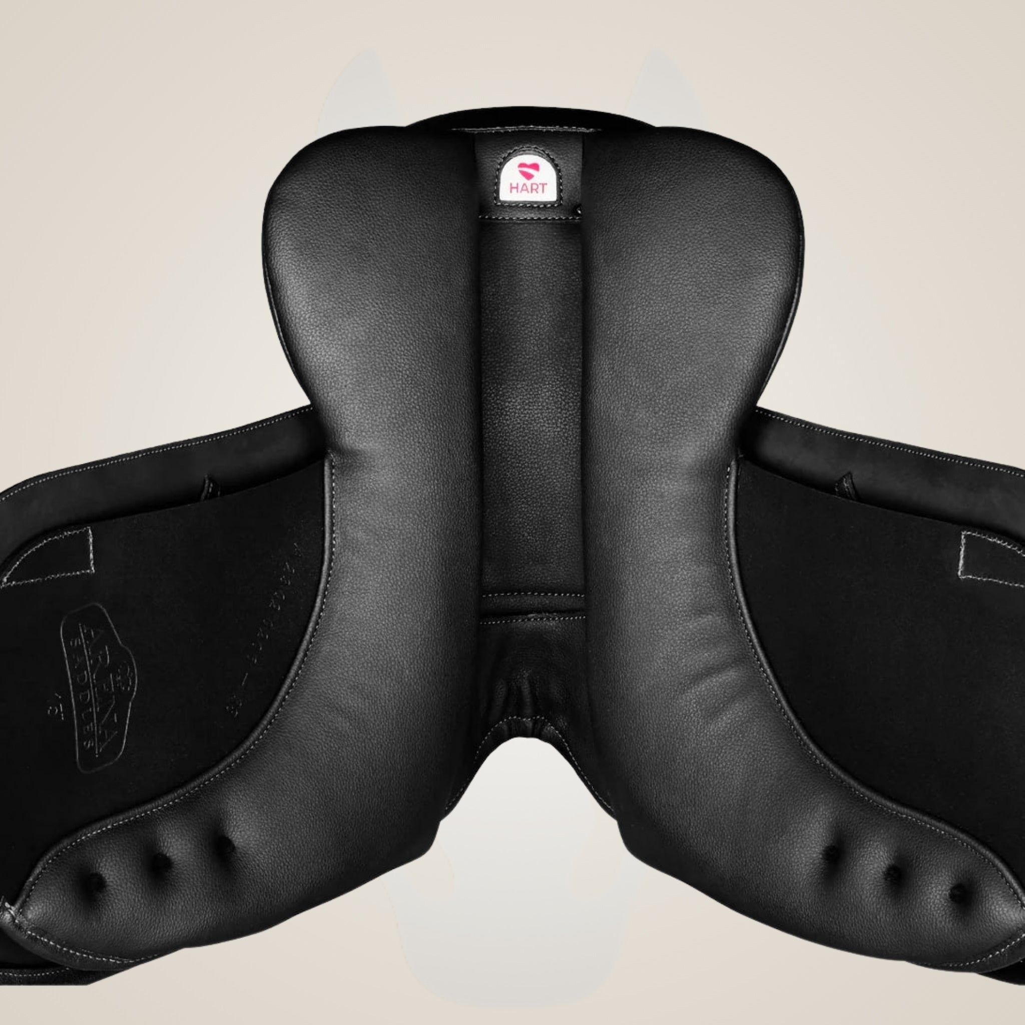 Arena Dressage Pony Saddle detail view on One-Eyed Equine cream background