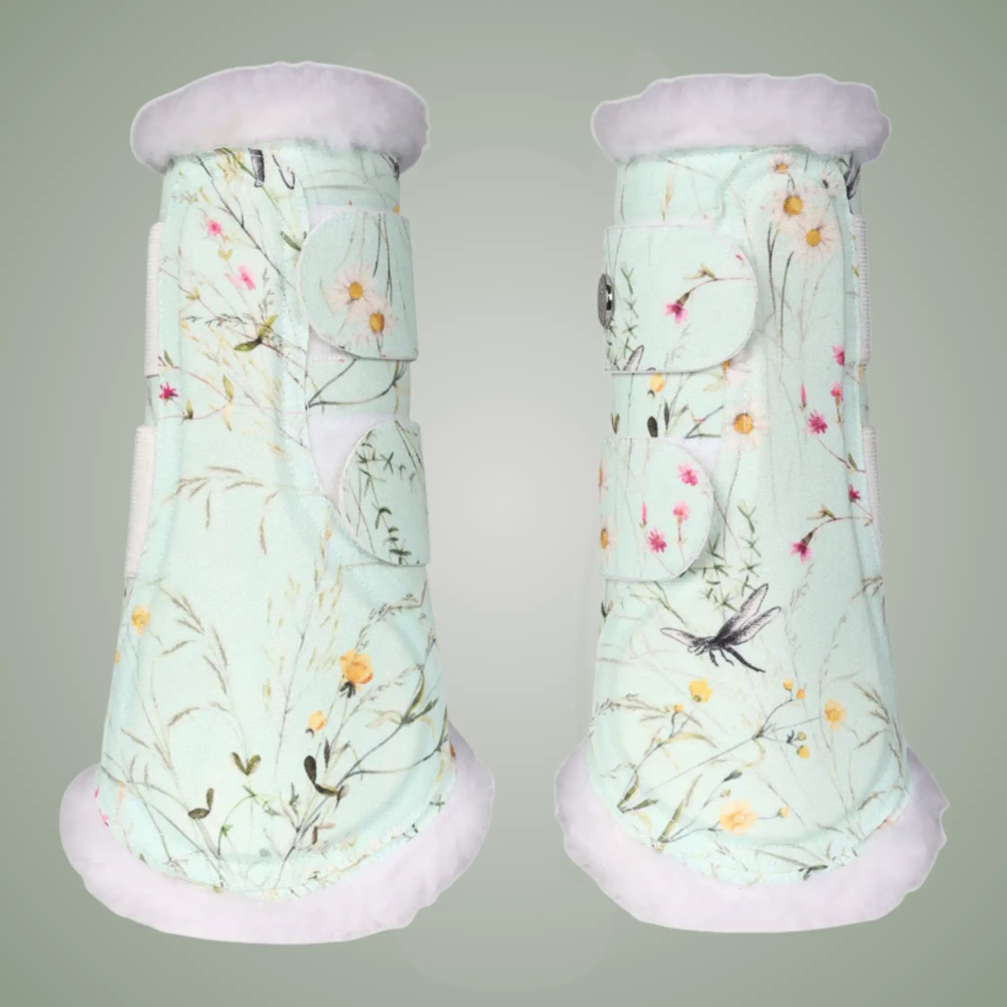 Pair of floral-patterned brush boots on a gray background
