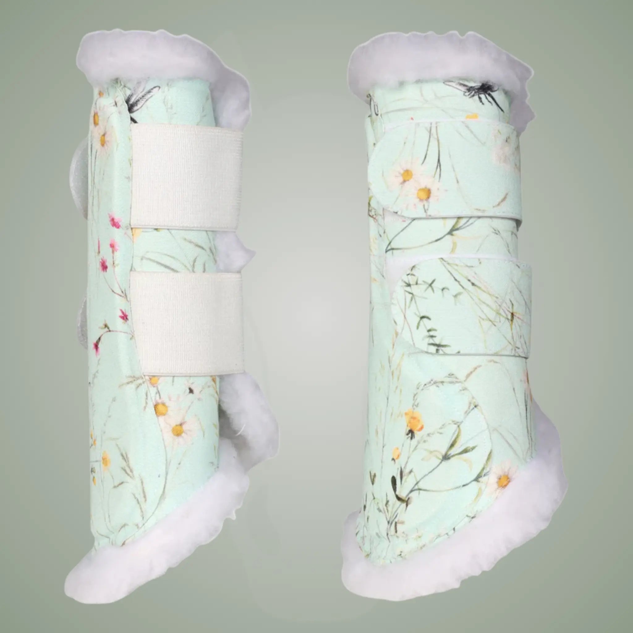 Pair of floral-patterned brush boots on a gray background