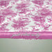 Pink and white patterned fabric with 'good vibes only' text on a light gray background