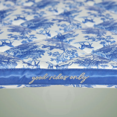 Blue and white patterned fabric with 'good rides only' text
