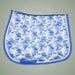 Blue and white patterned saddle pad on a gray background