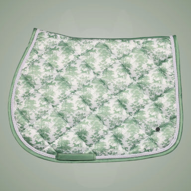 Green and white patterned saddle pad on a light green background