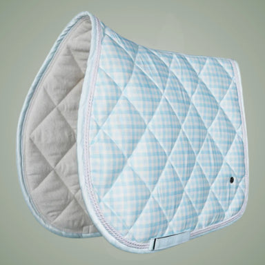 Quilted saddle pad with blue and white checkered pattern on a gray background