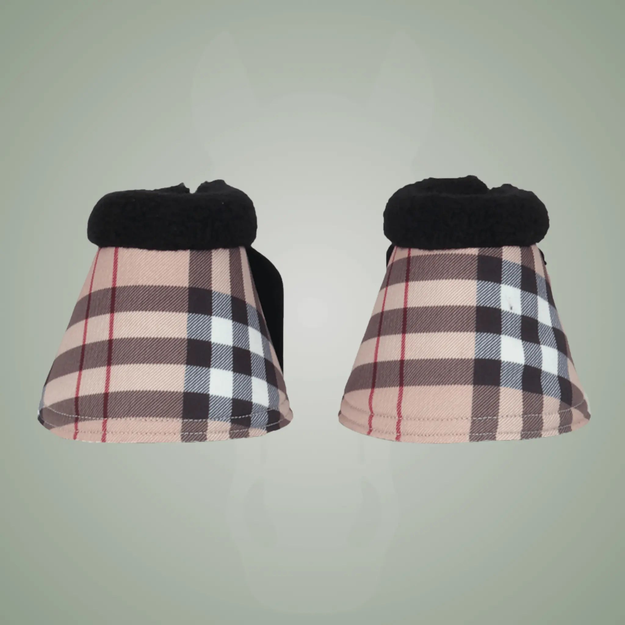 Pair of plaid horse boots with black fur trim on a light gray background