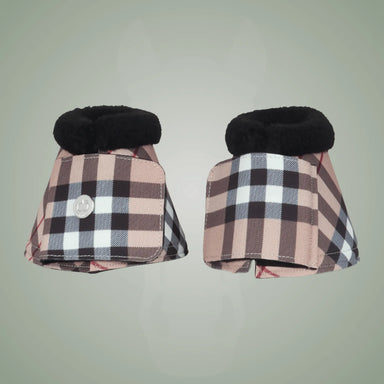 Pair of plaid horse boots with black fur lining on a light gray background