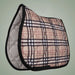 Plaid patterned saddle pad on a plain background