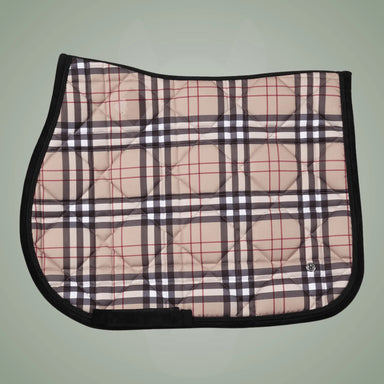 Plaid patterned saddle pad with black border on a light green background