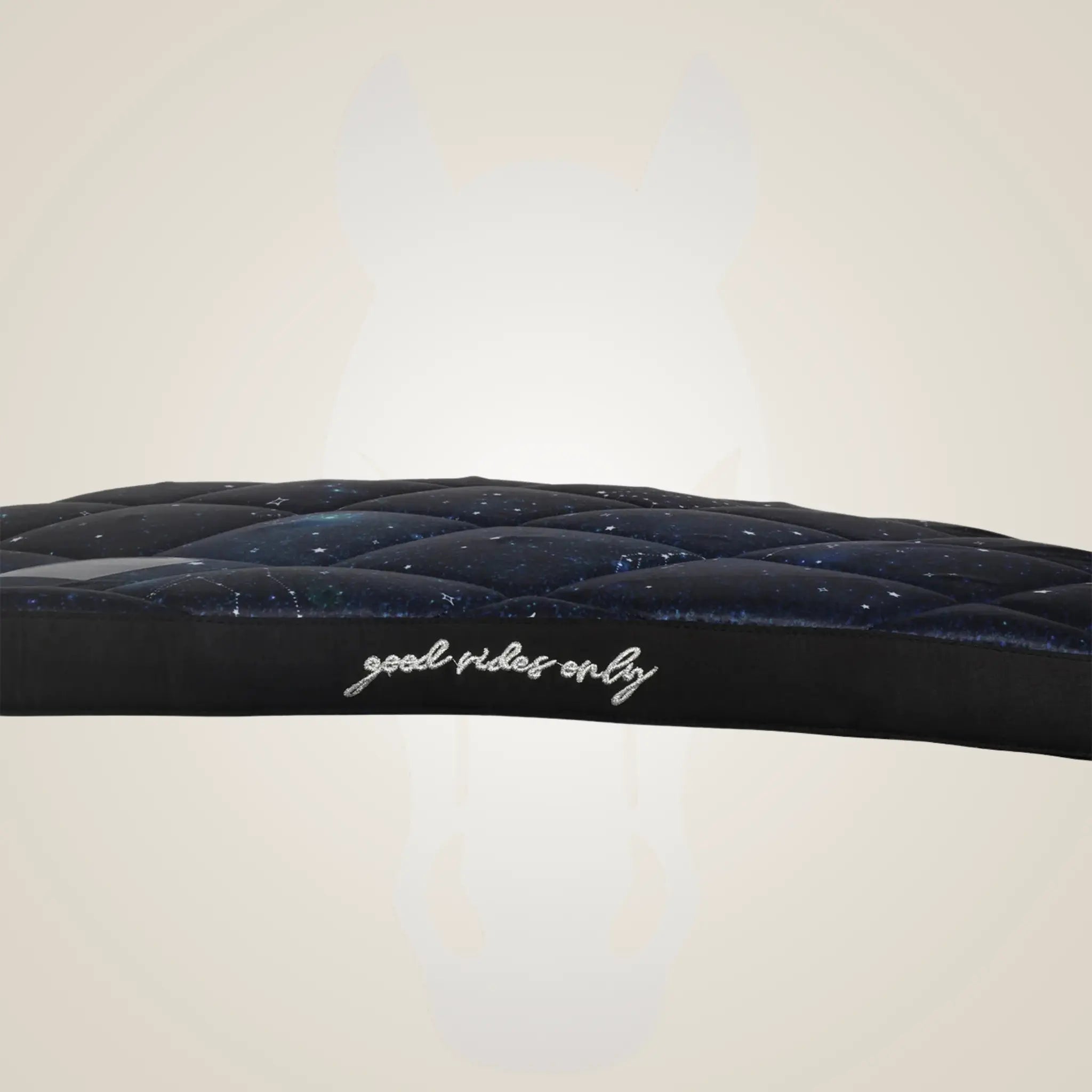 Black quilted seat cover with 'good rides only' text on a white background