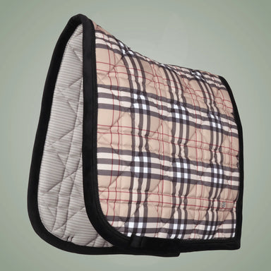 Plaid patterned saddle pad with black border on a light green background