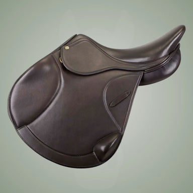 Brown leather saddle on a light green background