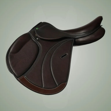 Brown leather saddle on a light gray background