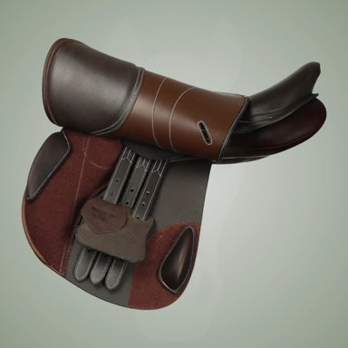 Brown leather saddle on a light gray background