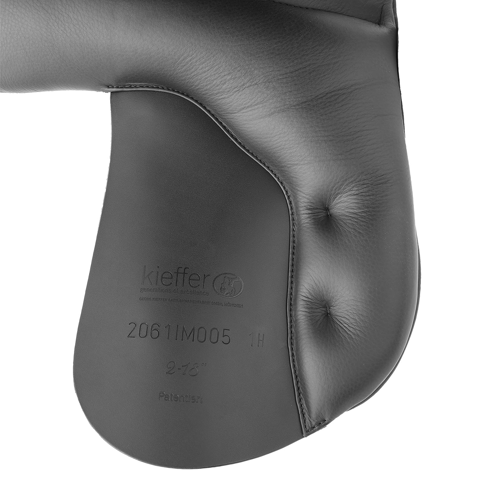 Kieffer Cannes dressage saddle in black, decorative piping detail on the cantle plate