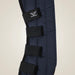 Navy blue protective leg wrap with black straps on a beige background