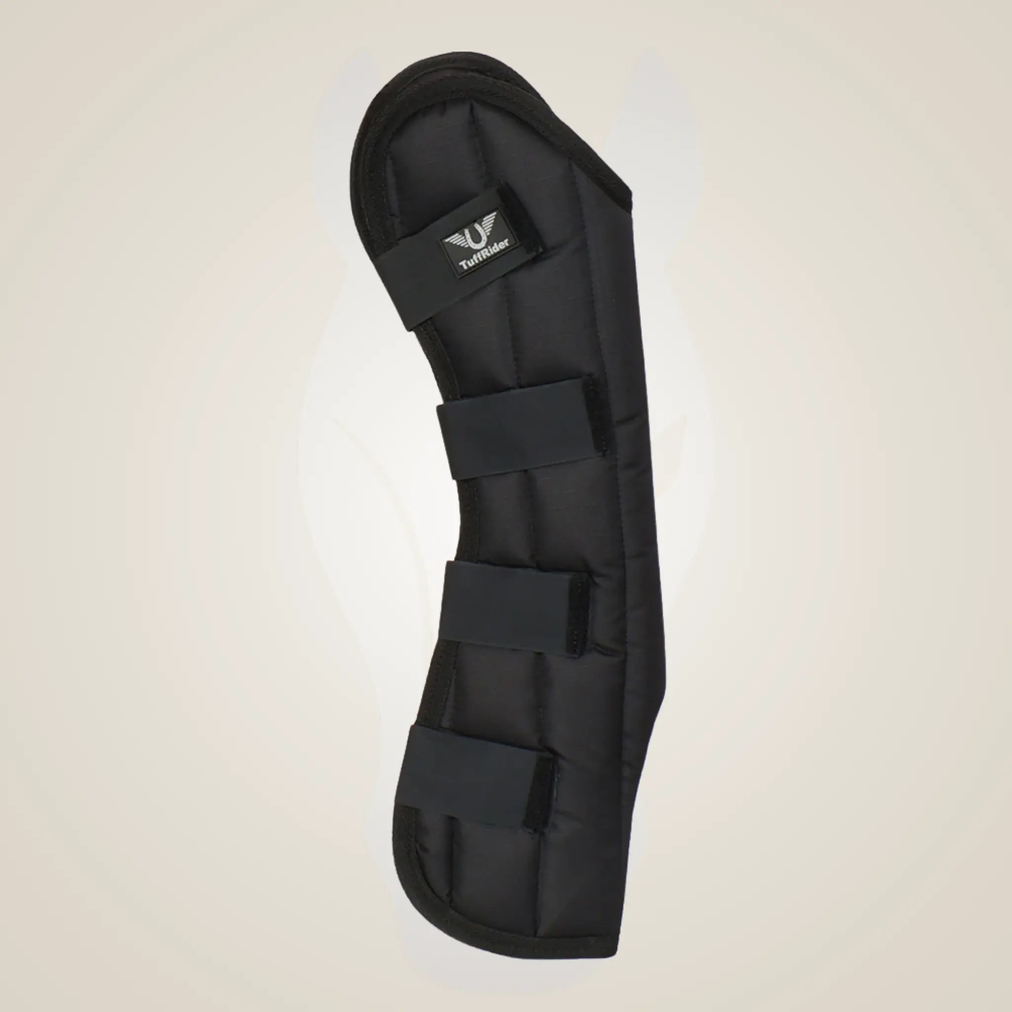 Black protective horse leg guard on a beige background