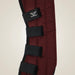 Maroon protective pad with black straps and TuffRider logo on a beige background