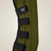 Green protective pad with black straps and TuffRider logo on a beige background