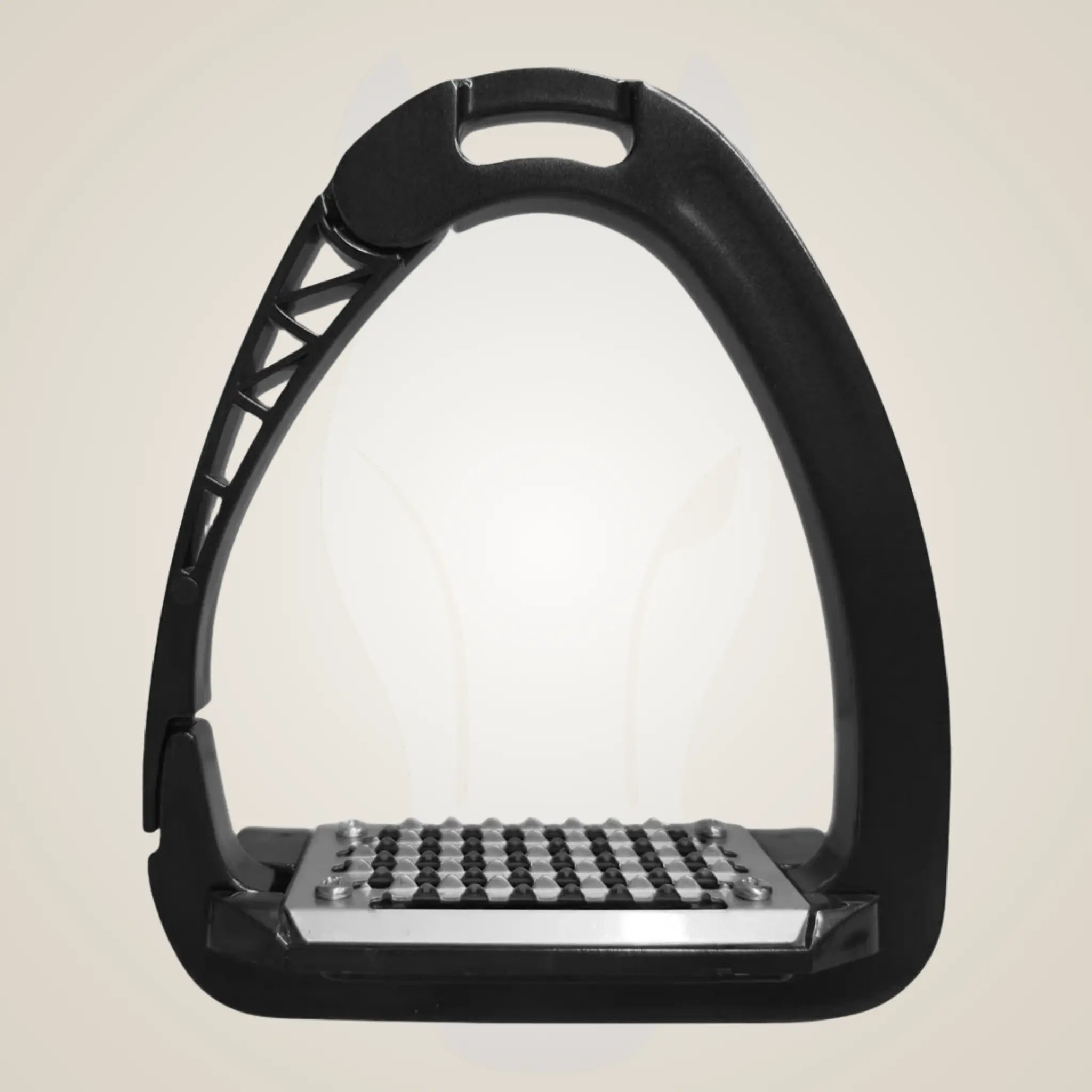 Black equestrian stirrup with metallic tread on a beige background