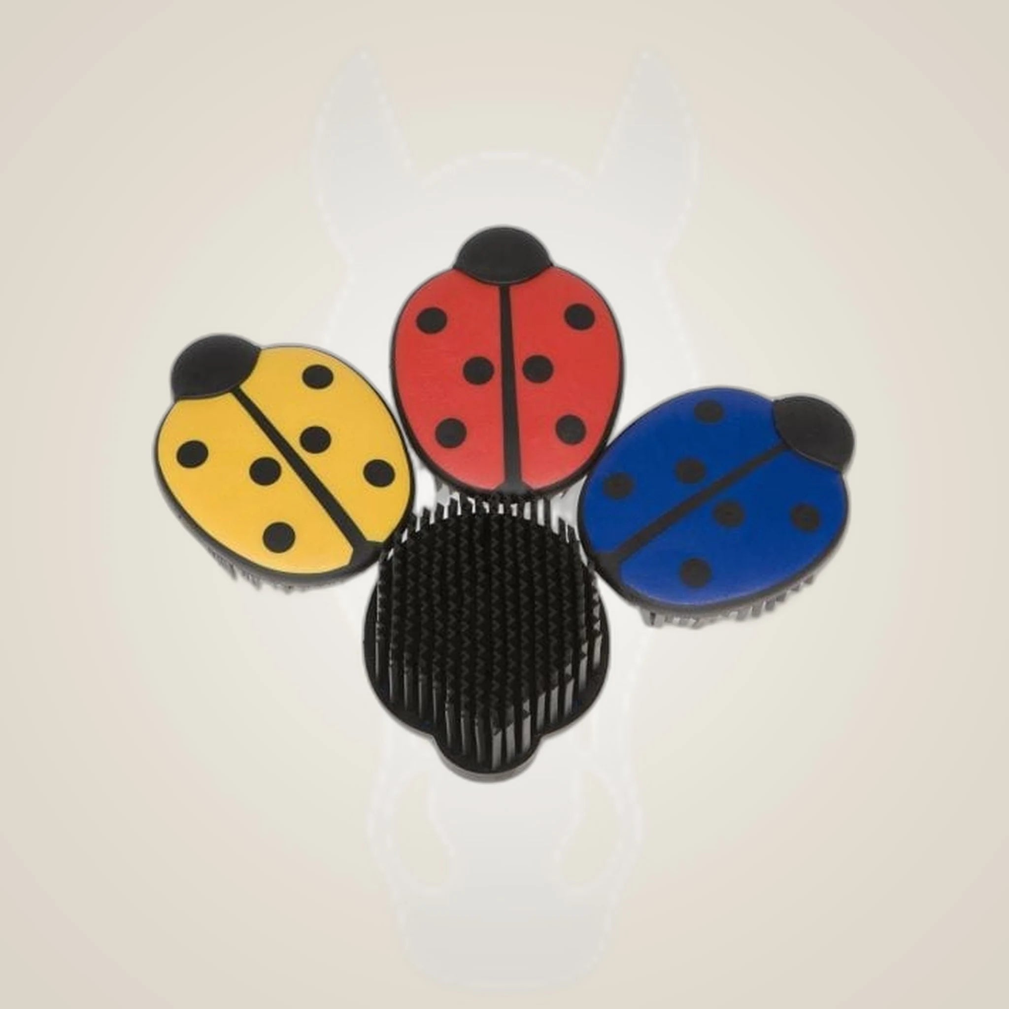 Kieffer Ladybug Mini Grooming Brush on One-Eyed Equine branded background