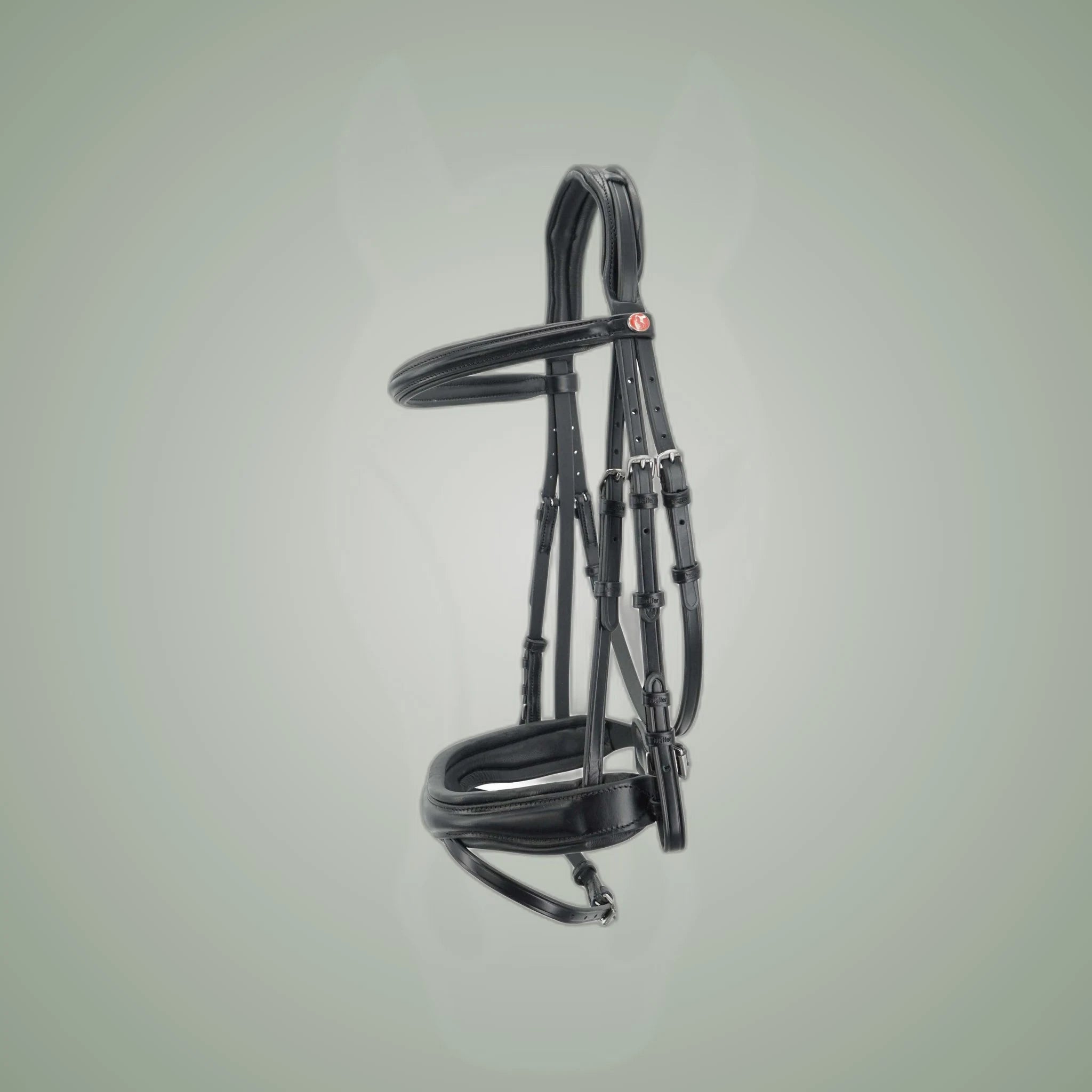 Kieffer Perseus Snaffle Bridle on One-Eyed Equine branded background