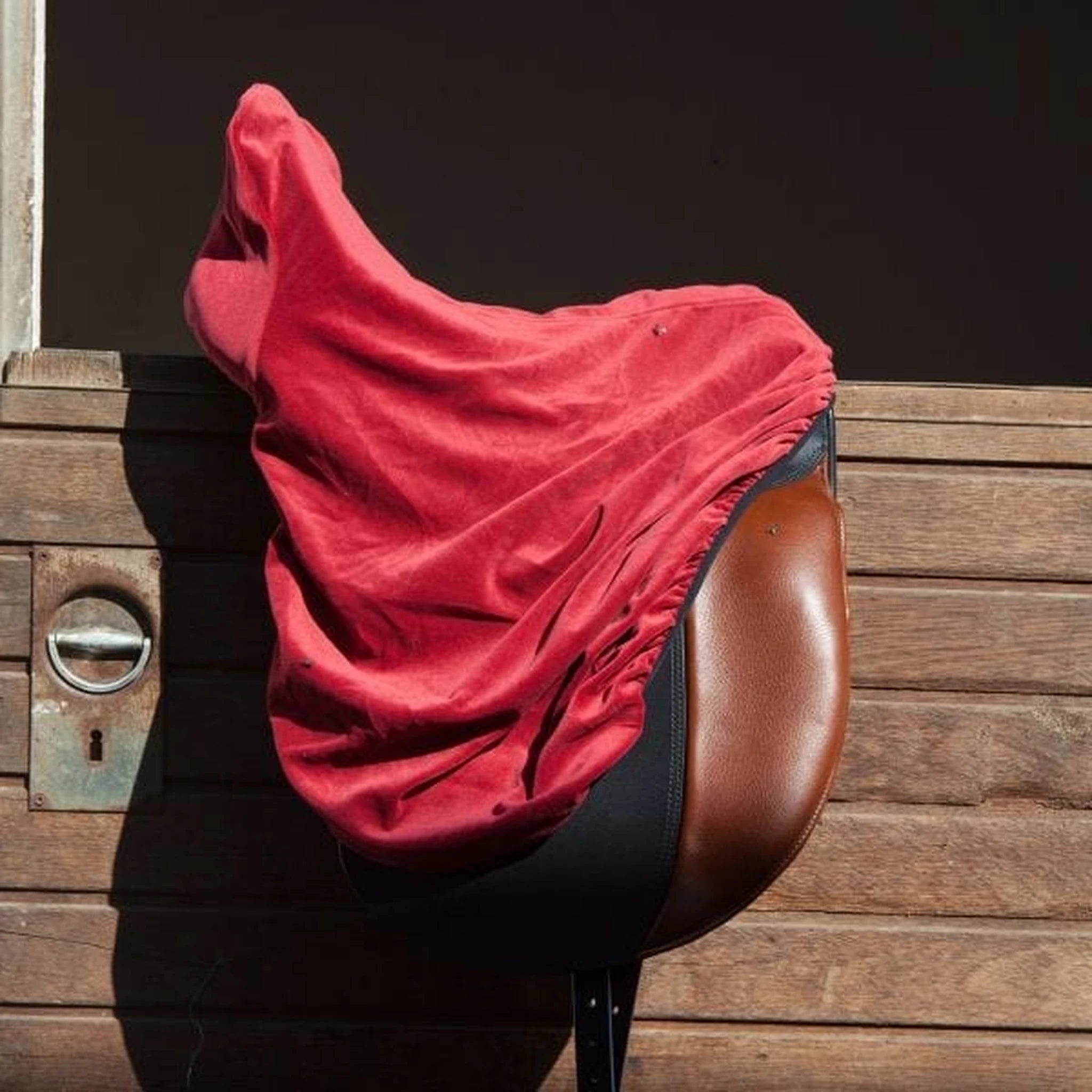 Kieffer Saddle Cover on One-Eyed Equine branded background