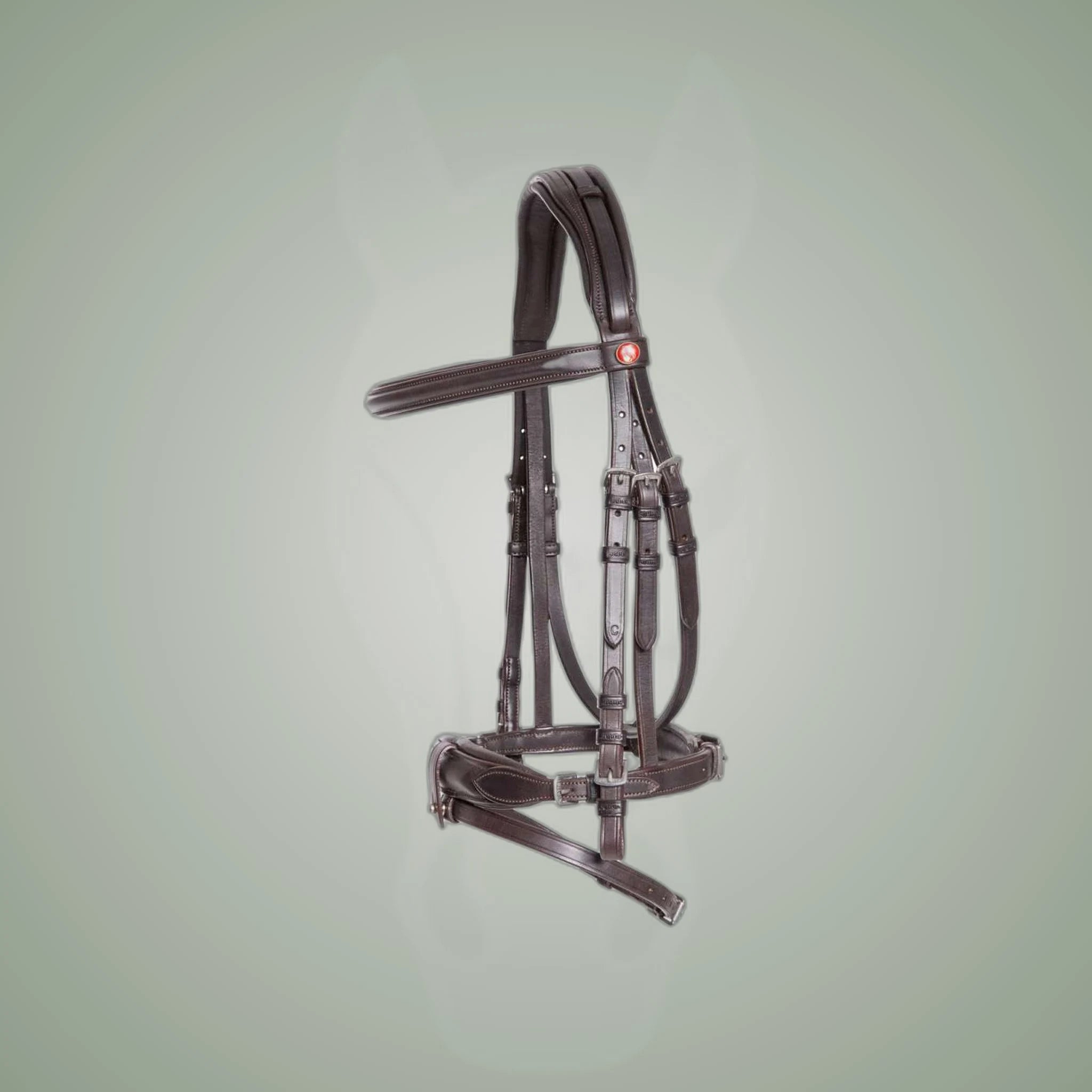 Kieffer Ultrasoft Unah Snaffle Bridle on One-Eyed Equine branded background