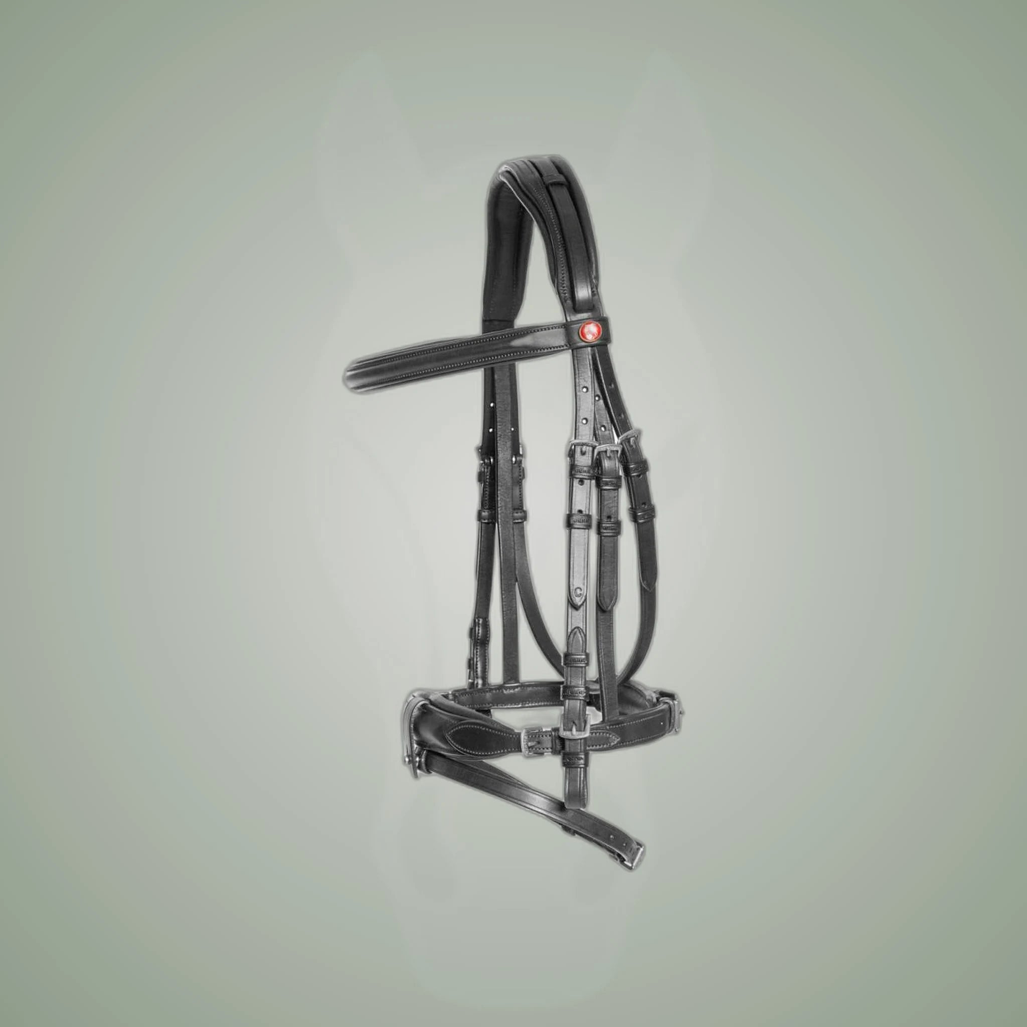 Kieffer Ultrasoft Unah Snaffle Bridle on One-Eyed Equine branded background